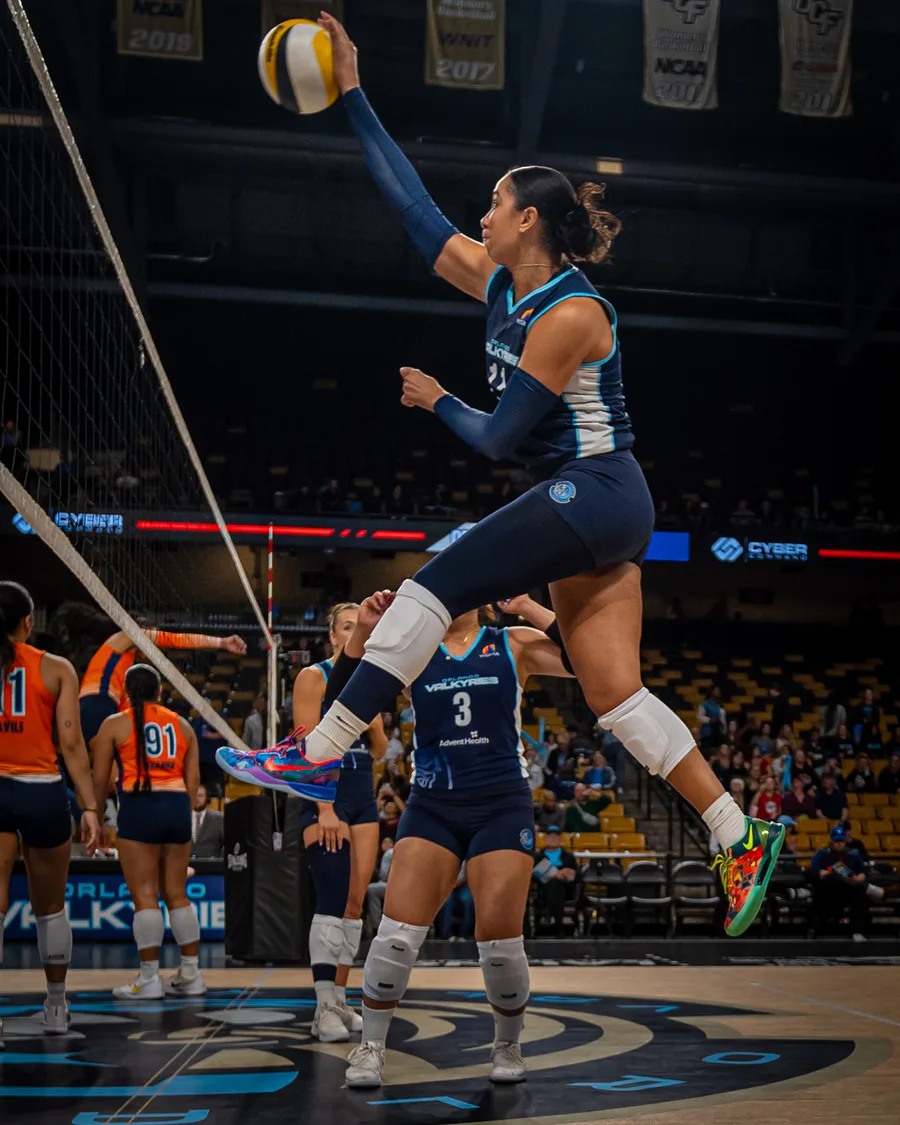 Orlando Valkyries attack at the net with Cyber Command courtside