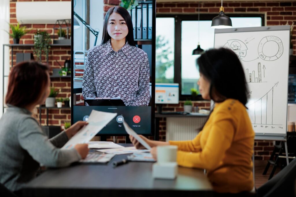 Businesswomen collaborating together at management project