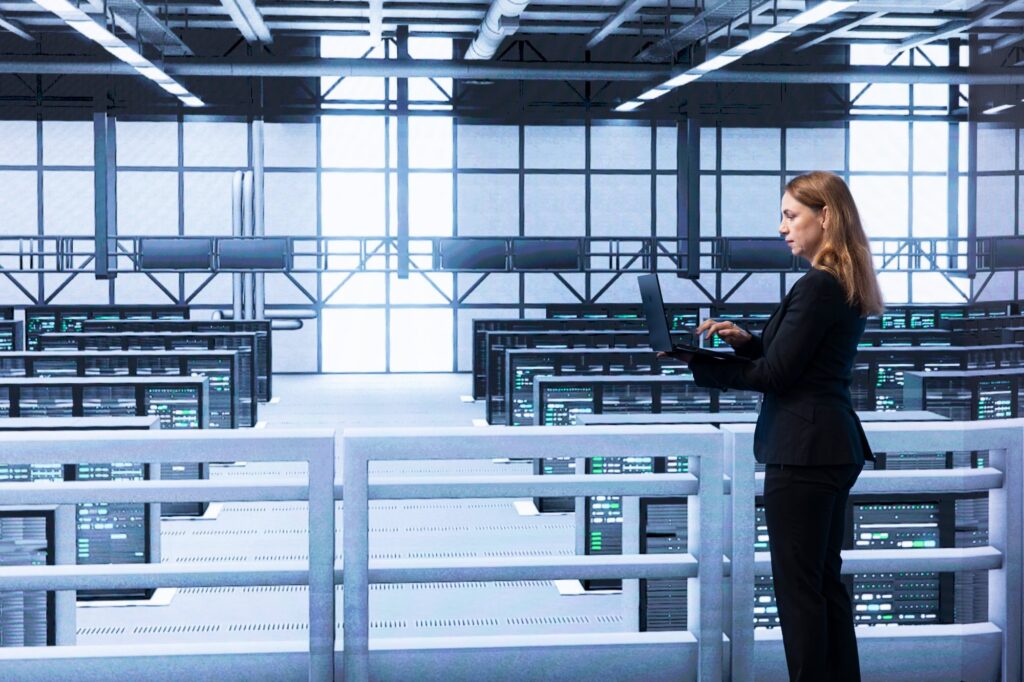 Engineer in data center checking rigs and infrastructure