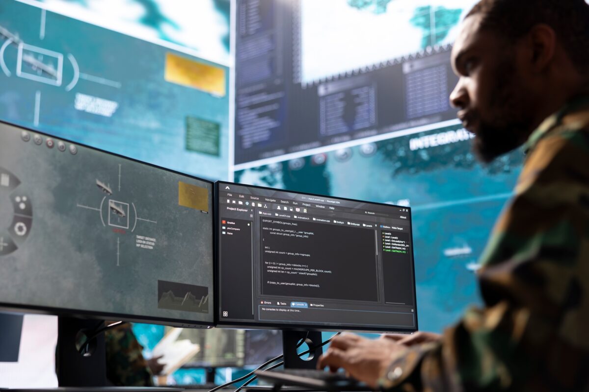 Intelligence agents in a modern operations center managing surveillance activity