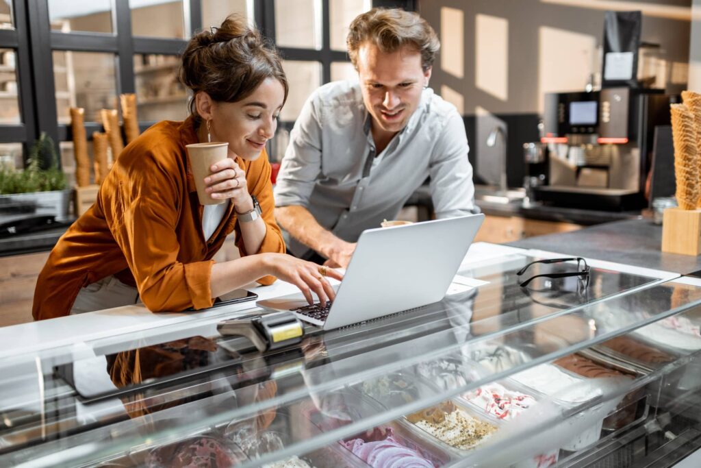 Man and woman managing their small business
